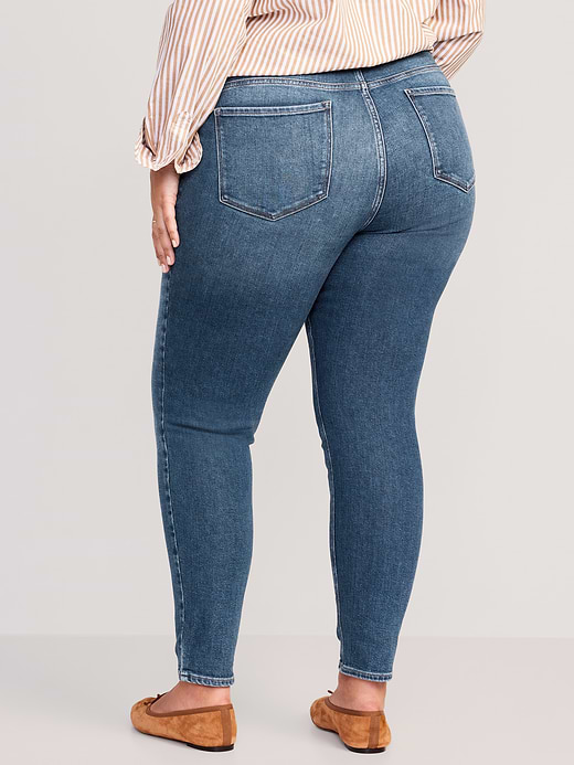 Old Navy Mid-Rise Rockstar Super-Skinny Ankle Jeans — photo 9